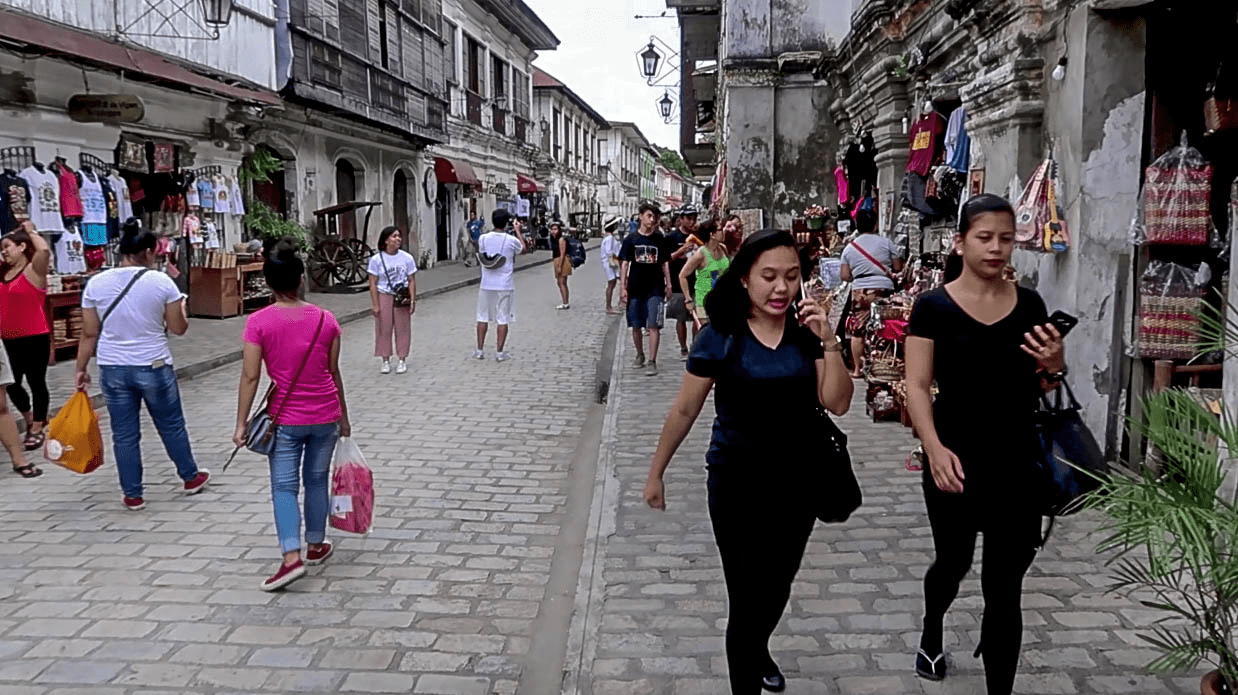 people souvenir shopping in the calle crisologo famous touristic street in vigan city ilocos sur philippines