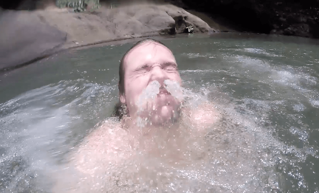 lennythroughparadise enjoying the water from the hulugan falls waterfall in laguna philippines